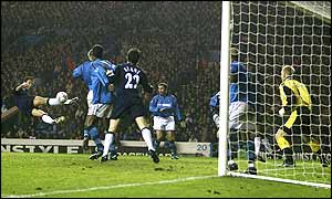 Gustavo Poyet virtually makes certain of three points for Spurs as he scores their third goal of the evening