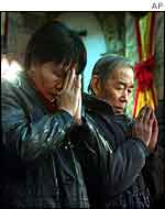 Roman Catholics at Christmas service in Beijing's Immaculate Conception Cathedral 