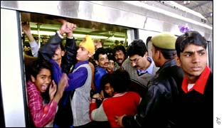Passengers on a crowded metro platform