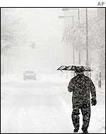 A man walks through the snow in Wilkes-Barre, Pennsylvania