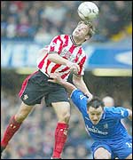 James Beattie and John Terry battle for the ball