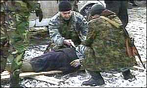 Wounded are taken away on makeshift stretchers (Pictures: TVS television channel)