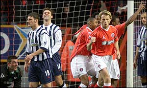 Gary Rowett celebrates as Kevin Lisbie gives Charlton the lead