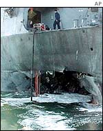 A hole ripped in the side of the USS Cole