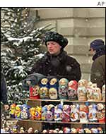 Stallholder selling Russian dolls in Red Square