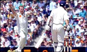 Australian bowler Brett Lee celebrates after taking the wicket of England opener Michael Vaughan