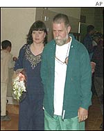 Donald W. Caswell (right) attends the memorial service in Sanaa