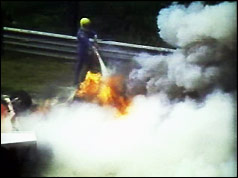 Lauda's burning car is put out