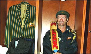 Steve Waugh smiles as he sits in the Australian dressing room after scoring his 10,000th Test run