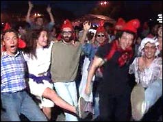 Photograph of people celebrating the 200th Bastille Day in Paris