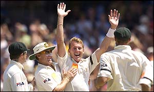 Brett Lee celebrates with his team-mates after taking Marcus Trescothick's wicket