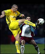 Dominc Matteo defends the ball against Scunthorpe's Steve Torpey