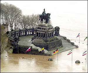 Famous landmark Deutsches Eck in Koblenz, western Germany lies partially submerged