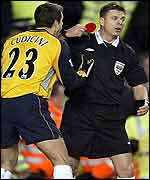 Referee Mark Halsey prepares to show Cudicini the red card