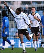 Louis Saha celebrates his goal against Birmingham