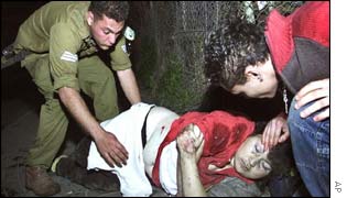 Attack victim being helped by the emergency services