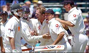Damien Martyn leaves the field as England celebrate his dismissal