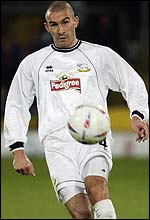 Danny Higginbotham in action for Derby