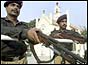 Pakistani police guard a Catholic church in Rawalpindi