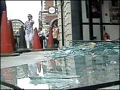 Photograph of shattered glass near the Israeli Embassy in London