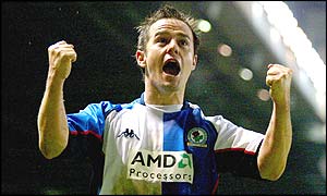 David Thompson clenches his raised fists to celebrate scoring Blackburn's equaliser
