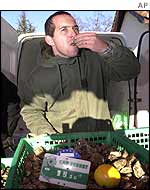 A French oyster farmer samples his wares