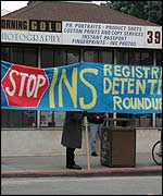 Protesters in front of the IND office in San Francisco