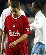 Striker Michael Owen looks dejected as Liverpool fail to win again