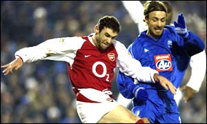 Martin Keown collides with Christophe Dugarry