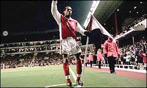 February 2000 - Henry salutes the crowd after a brace against Sunderland