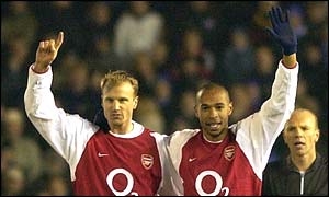 Thierry Henry and Dennis Bergkamp celebrate