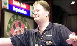 Barneveld celebrates his 6-3 victory to win the world title