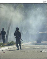 Riot police during Sunday's unrest