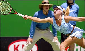 Anna Kournikova plays a forehand