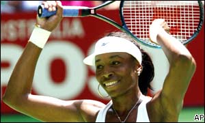 Venus Williams punches the air after her first round win
