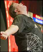 Raymond Barneveld celebrates his third Embassy world title