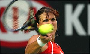 Capriati returns strongly with a forehand against Weingartner