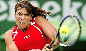 Defending champion Jennifer Capriati returns double-handed against Germany's Marlene Weingartner 