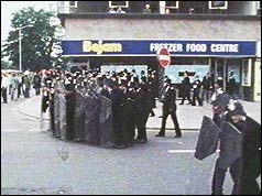 Police using riot shields 
