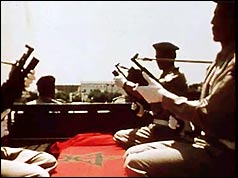 Soldiers guard the coffins at the state funeral