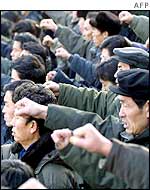 North Koreans protest in support of leader Kim Jong-il