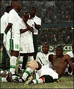Nigerian players mourn defeat in the Cup of Nations
