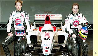 Jenson Button and Jaques Villeneuve pose with the new BAR 005