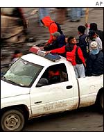 Mexicans ride a stolen police car