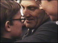 Tiede Herrema greets two of his sons after his release