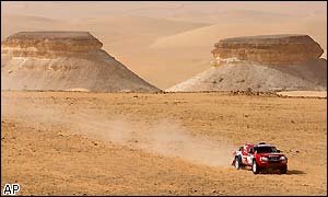 Ari Vatanen of Finland drives his Nissan across the dessert in Siwa