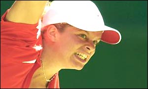 Kim Clijsters serves to Petra Mandula