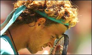 Gustavo Kuerten looks disappointed after losing in Melbourne