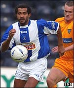 Samuel Boutal (left) in rare action for Kilmarnock