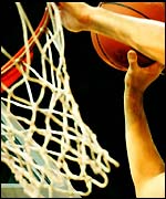 Youngsters gather for prayers before playing basketball